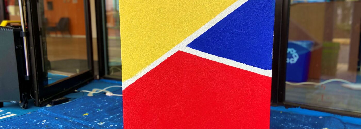 brightly repainted trash can