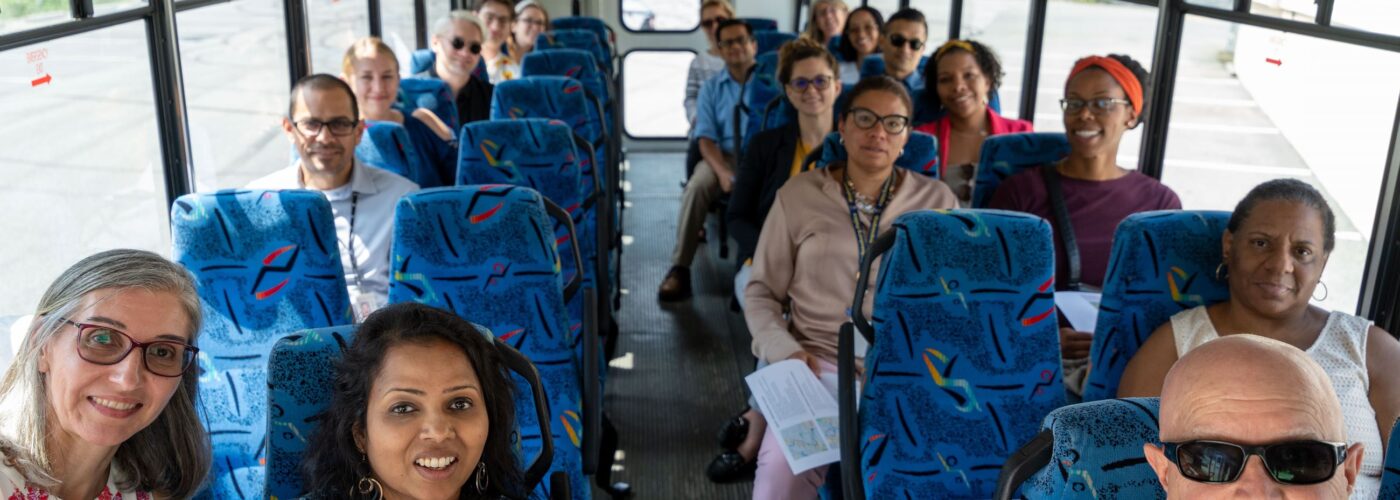 group of adults on a bus