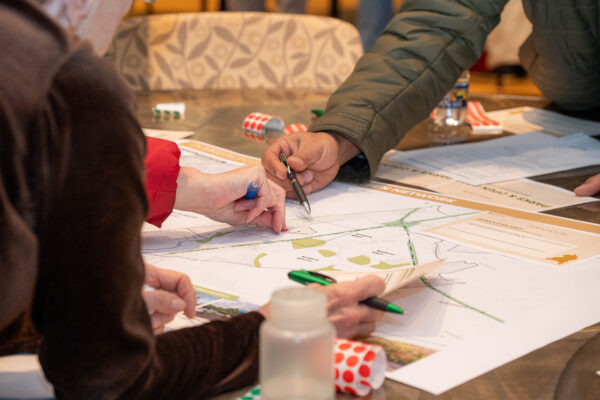 Subregion 1 Minor Plan Amendment project community meeting - citizens and planners reviewing area maps at the January 21, 2026 meeting