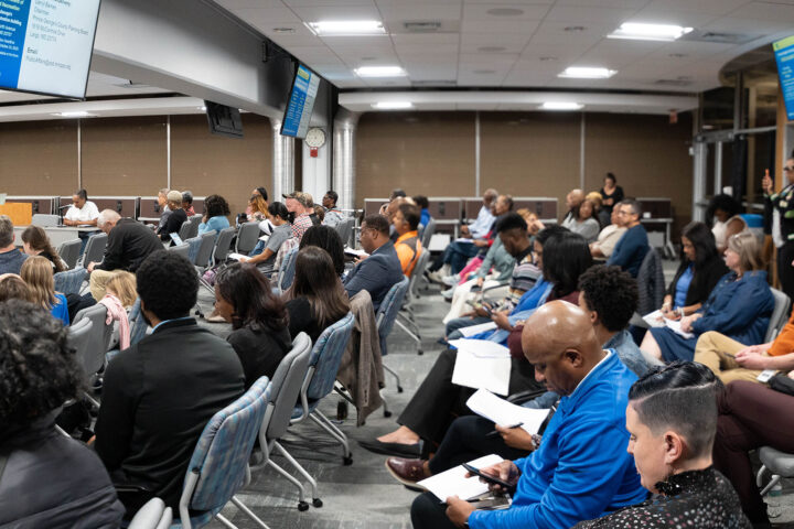 audience sitting at budget forum in the auditorium at the Parks and Recreation Administration Building